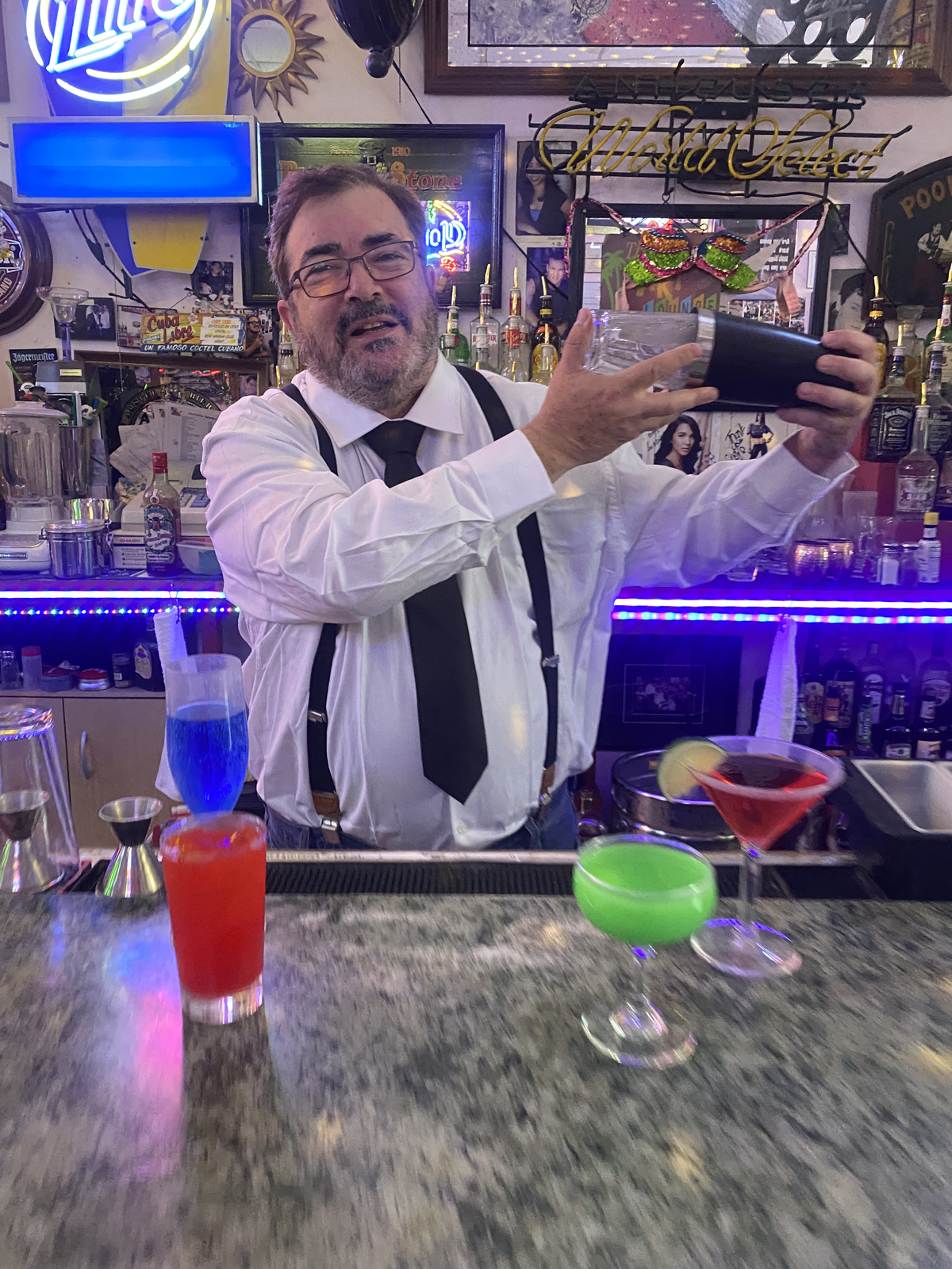 Alexander Ferrari Miller in a bartending environment
